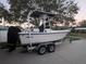 White Mako fishing boat on a trailer at 1820 E Leewynn Dr, Sarasota, FL 34240