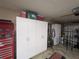 Garage with additional storage cabinets and toolboxes at 1820 E Leewynn Dr, Sarasota, FL 34240