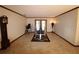 Private home gym with various exercise equipment and access to the backyard at 1820 E Leewynn Dr, Sarasota, FL 34240