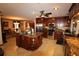 Island kitchen with granite countertops and wood cabinets at 1820 E Leewynn Dr, Sarasota, FL 34240