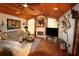 Spacious living room features a fireplace and hardwood floors at 1820 E Leewynn Dr, Sarasota, FL 34240