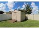 Yard with storage shed and privacy fence at 1820 E Leewynn Dr, Sarasota, FL 34240