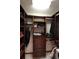 Well-organized walk-in closet with ample shelving and drawers at 1820 E Leewynn Dr, Sarasota, FL 34240