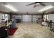 Spacious workshop with multiple garage doors at 1820 E Leewynn Dr, Sarasota, FL 34240
