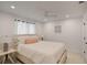 Bright bedroom with a comfortable bed and soft decor at 1899 Buccaneer Cir, Sarasota, FL 34231