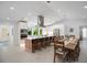 Bright kitchen with island, stainless steel appliances, and view to backyard at 1899 Buccaneer Cir, Sarasota, FL 34231
