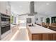 Spacious kitchen boasts modern appliances, large island, and a bright, open layout at 1899 Buccaneer Cir, Sarasota, FL 34231