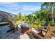 Bright patio with fire pit and comfortable seating at 1899 Buccaneer Cir, Sarasota, FL 34231