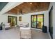 Covered patio with ceiling fan and access to the pool at 1899 Buccaneer Cir, Sarasota, FL 34231