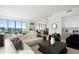 Modern living area with an open floor plan and city views at 301 Quay Commons # 1904, Sarasota, FL 34236