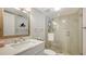 Updated bathroom with a quartz vanity and walk-in shower at 304 Spring Lakes Blvd # 304, Bradenton, FL 34210