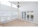 Bright dining area with french doors leading to the outdoors at 4028 Mira Lago Dr, Sarasota, FL 34238