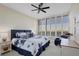 Bright bedroom with king-size bed and plantation shutters at 415 L Ambiance Dr # C403, Longboat Key, FL 34228