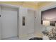 Building lobby with elevators and seating area at 415 L Ambiance Dr # C403, Longboat Key, FL 34228