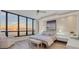 Bright main bedroom with stunning ocean views and ample natural light at 415 L Ambiance Dr # C403, Longboat Key, FL 34228