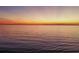 Ocean view at sunset with a colorful sky at 415 L Ambiance Dr # C403, Longboat Key, FL 34228