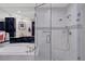 Large walk-in shower with marble tile and dual shower heads at 415 L Ambiance Dr # C403, Longboat Key, FL 34228