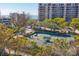 Community tennis court with seating area at 415 L Ambiance Dr # C403, Longboat Key, FL 34228