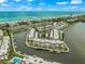 Aerial view of waterfront community with ocean views at 4360 Chatham Dr # 108, Longboat Key, FL 34228