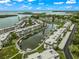 Aerial view of waterfront community with boat slips at 4360 Chatham Dr # 108, Longboat Key, FL 34228