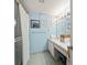Bathroom with shower/tub combo and vanity at 4360 Chatham Dr # 108, Longboat Key, FL 34228