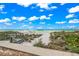 Beach access with boardwalk stairs leading to the sandy shore at 4360 Chatham Dr # 108, Longboat Key, FL 34228