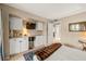 Bedroom with built in desk and TV at 4360 Chatham Dr # 108, Longboat Key, FL 34228