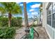 Green bike parked near lush greenery at 4360 Chatham Dr # 108, Longboat Key, FL 34228