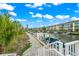 Scenic waterfront pathway with boats at 4360 Chatham Dr # 108, Longboat Key, FL 34228