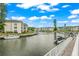 Calm waterfront with docked boats at 4360 Chatham Dr # 108, Longboat Key, FL 34228