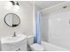 Clean bathroom with a shower/tub combo and white vanity at 445 Horseshoe Loop Rd, Terra Ceia, FL 34250