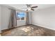 Bright bedroom with wood-look floors and a ceiling fan at 445 Horseshoe Loop Rd, Terra Ceia, FL 34250