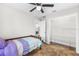 Bedroom with laundry access and shelving at 445 Horseshoe Loop Rd, Terra Ceia, FL 34250