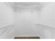 Large walk-in closet with wire shelving at 445 Horseshoe Loop Rd, Terra Ceia, FL 34250