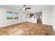Bright kitchen with wood cabinets, stainless steel appliances, and breakfast bar at 445 Horseshoe Loop Rd, Terra Ceia, FL 34250
