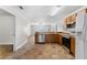 Open kitchen with stainless steel appliances and wood cabinets at 445 Horseshoe Loop Rd, Terra Ceia, FL 34250
