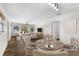 Open living and dining area with hardwood floors at 445 Horseshoe Loop Rd, Terra Ceia, FL 34250