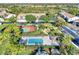 Resort-style pool and tennis court provide recreation options at 4655 Tower Hill Ln # 2412, Sarasota, FL 34238