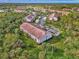 Aerial view showcasing condo location near lush greenery at 4655 Tower Hill Ln # 2412, Sarasota, FL 34238