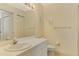 Simple bathroom with a toilet, sink, and mirror at 4655 Tower Hill Ln # 2412, Sarasota, FL 34238
