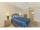 Bright bedroom with a double bed, nightstands, and dresser at 4655 Tower Hill Ln # 2412, Sarasota, FL 34238