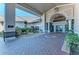 Elegant community entrance with landscaping and seating at 4655 Tower Hill Ln # 2412, Sarasota, FL 34238
