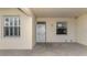 Private condo entry with tiled flooring and windows at 4655 Tower Hill Ln # 2412, Sarasota, FL 34238