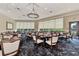 Elegant dining room with large windows at 4655 Tower Hill Ln # 2412, Sarasota, FL 34238