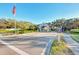 Gated community entrance with designated lanes for residents and visitors at 4655 Tower Hill Ln # 2412, Sarasota, FL 34238