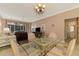 Living room with access to patio and bathroom at 4655 Tower Hill Ln # 2412, Sarasota, FL 34238
