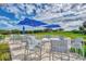 Patio furniture overlooking the golf course at 4655 Tower Hill Ln # 2412, Sarasota, FL 34238
