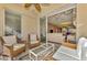 Sunroom with wicker furniture and view of living room at 4655 Tower Hill Ln # 2412, Sarasota, FL 34238