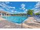 Inviting swimming pool with plenty of lounge chairs at 4655 Tower Hill Ln # 2412, Sarasota, FL 34238