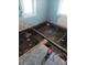 Unfinished basement area showing exposed floor joists and subfloor at 5 Palm Ave, Bradenton, FL 34208